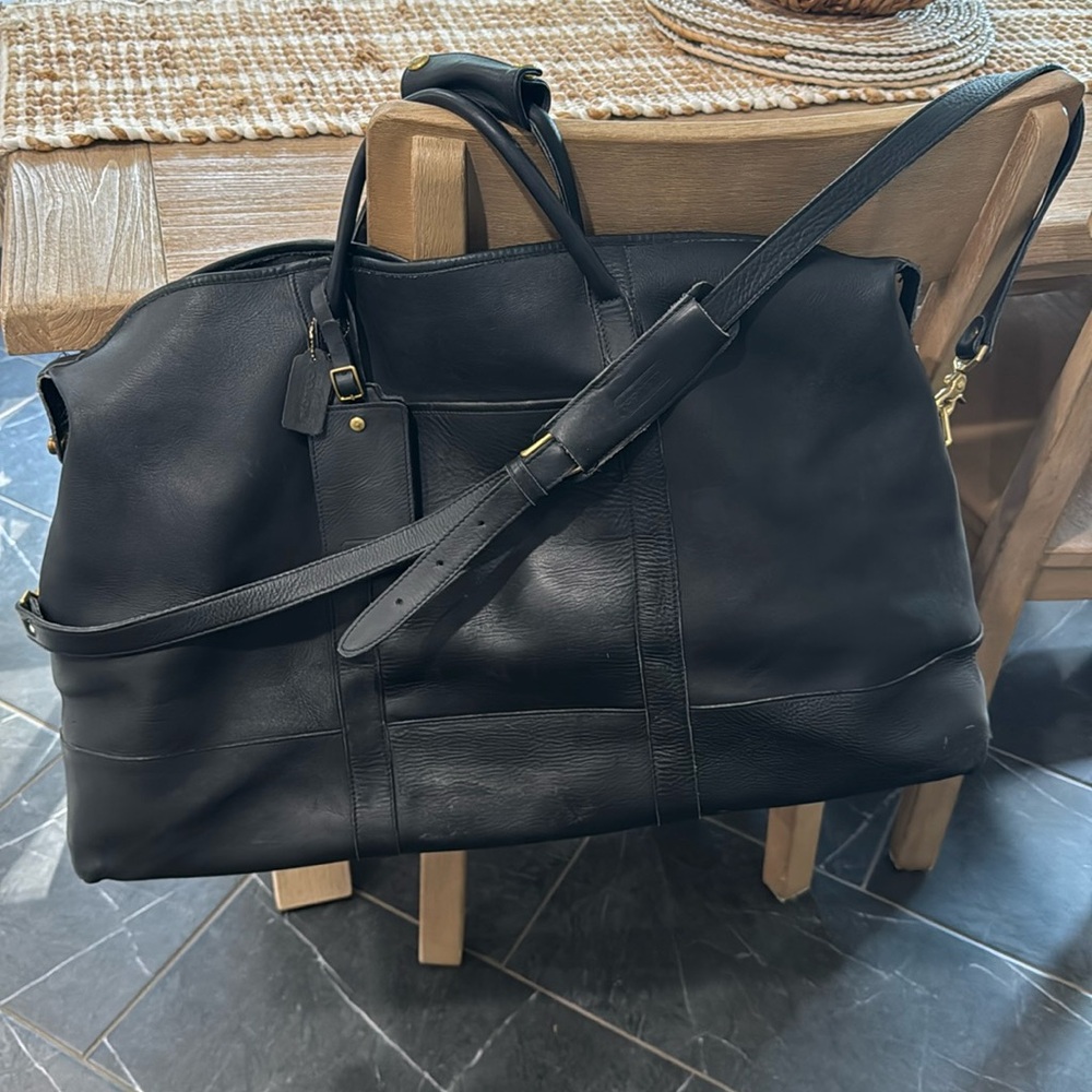 Vintage black leather coach large duffle/Trekker Bag. 26” wide x 16” high x 10”